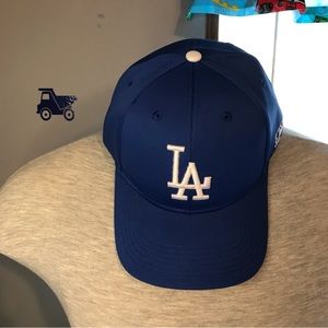 LA baseball hat blue with stickers and cardboard filler